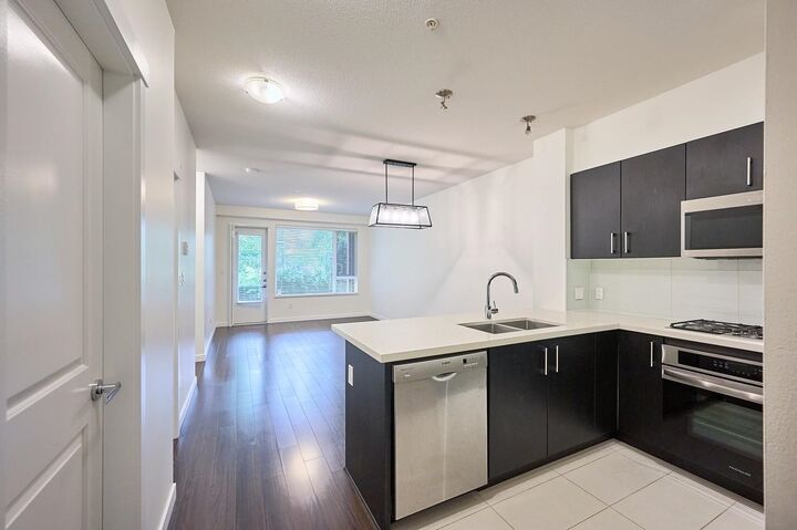 Property Photo:  3163 Riverwalk Avenue 102  BC V5S 0A7 