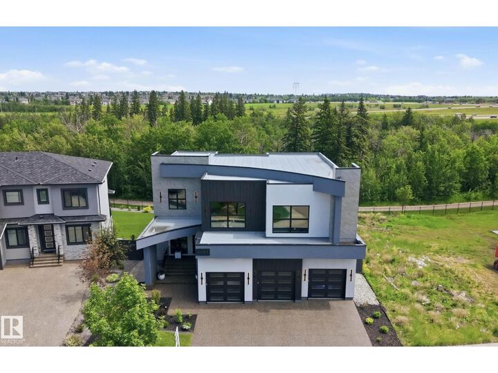 Property Photo:  4081 Whispering River Dr SW  AB T6W 2E2 