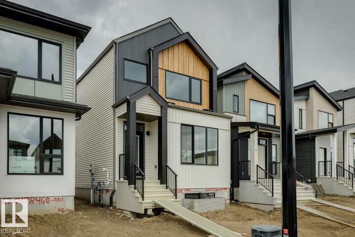 Property Photo: 7450 Klapstein Crescent SW AB T6W 5N8