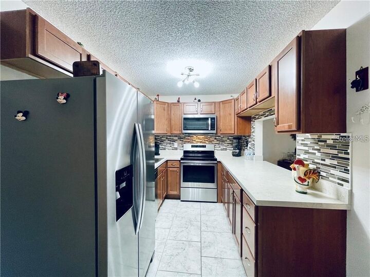 Property Photo:  1723 Pine Ridge Road 23  FL 32773 