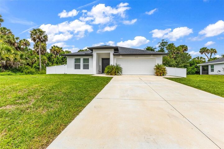 Property Photo:  203 Cayuga Street  FL 33954 