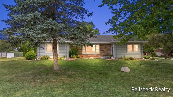 Property Photo:  85 Orchard Drive NW  MI 49345 