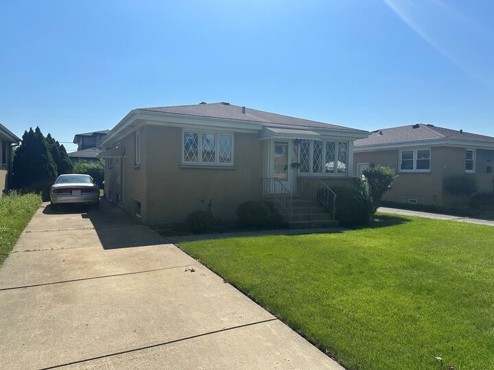 Property Photo:  4933 N Ozanam Avenue  IL 60706 