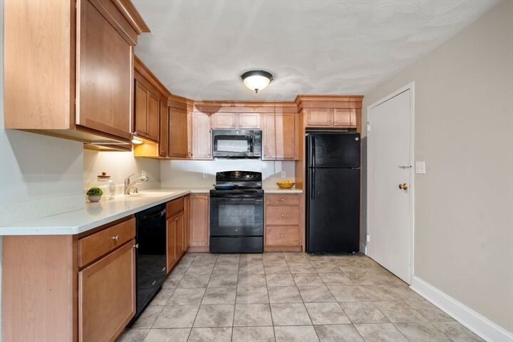 Property Photo: 1105 Lexington St 4-1 MA 02452