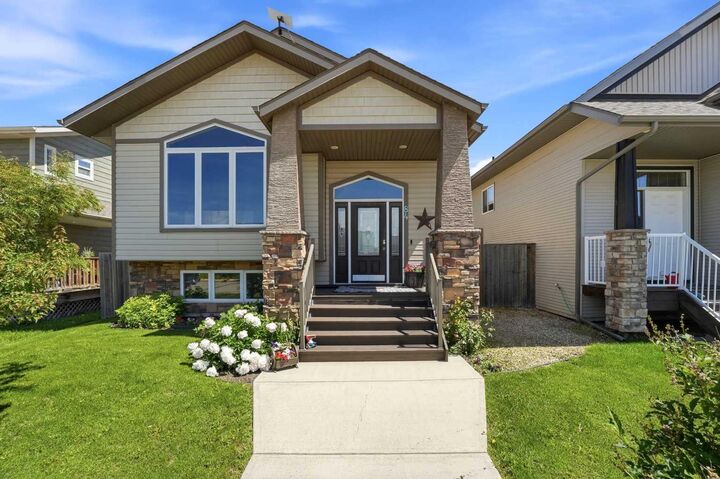 Property Photo: 84 Mackenzie Crescent AB T4L 0B3