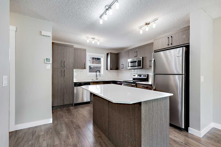 Property Photo:  1225 Kings Heights Way SE 606  AB T4A 0M4 