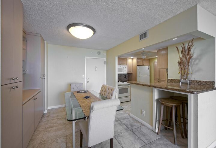 Property Photo:  111 Briny Avenue 22-12  FL 33062 