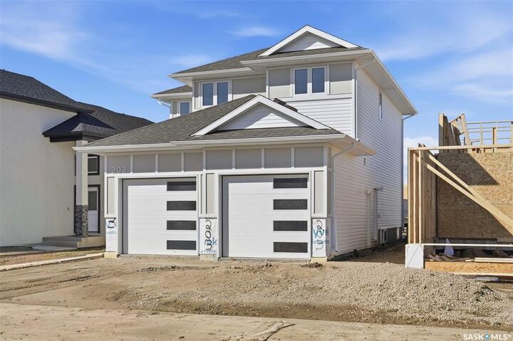 Property Photo: 203 Sharma Lane SK S7W 0Y4