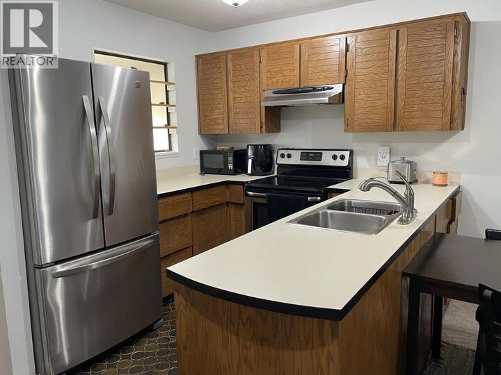 Property Photo:  4832 Lazelle Avenue 10  BC V8G 1T4 