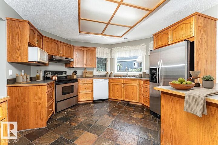 Property Photo: 221 Ockenden Place NW AB T6R 1K5