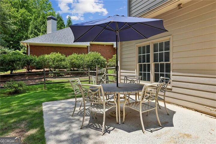 Property Photo:  6930 Olde Atlanta Parkway  GA 30024 
