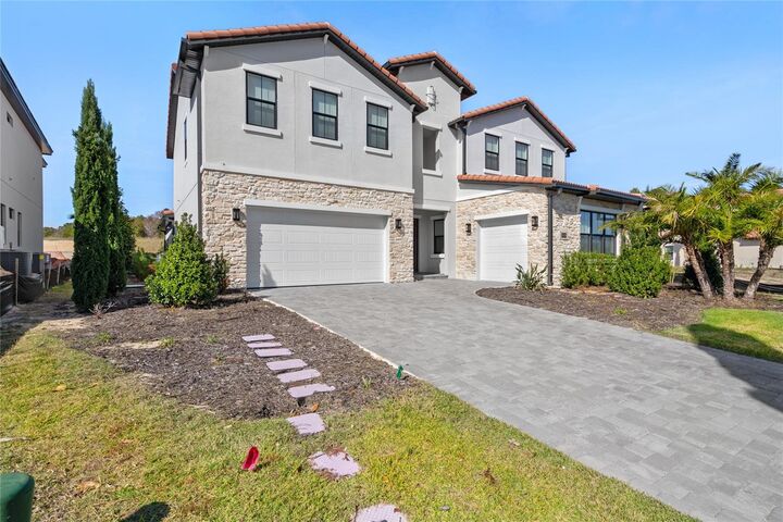 Property Photo: 16829 Bolsena Drive FL 34756
