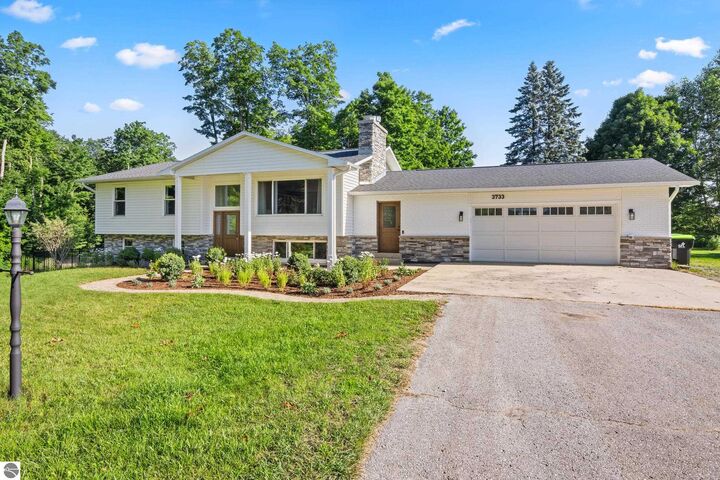 Property Photo:  3733 E Long Lake Road  MI 49685 