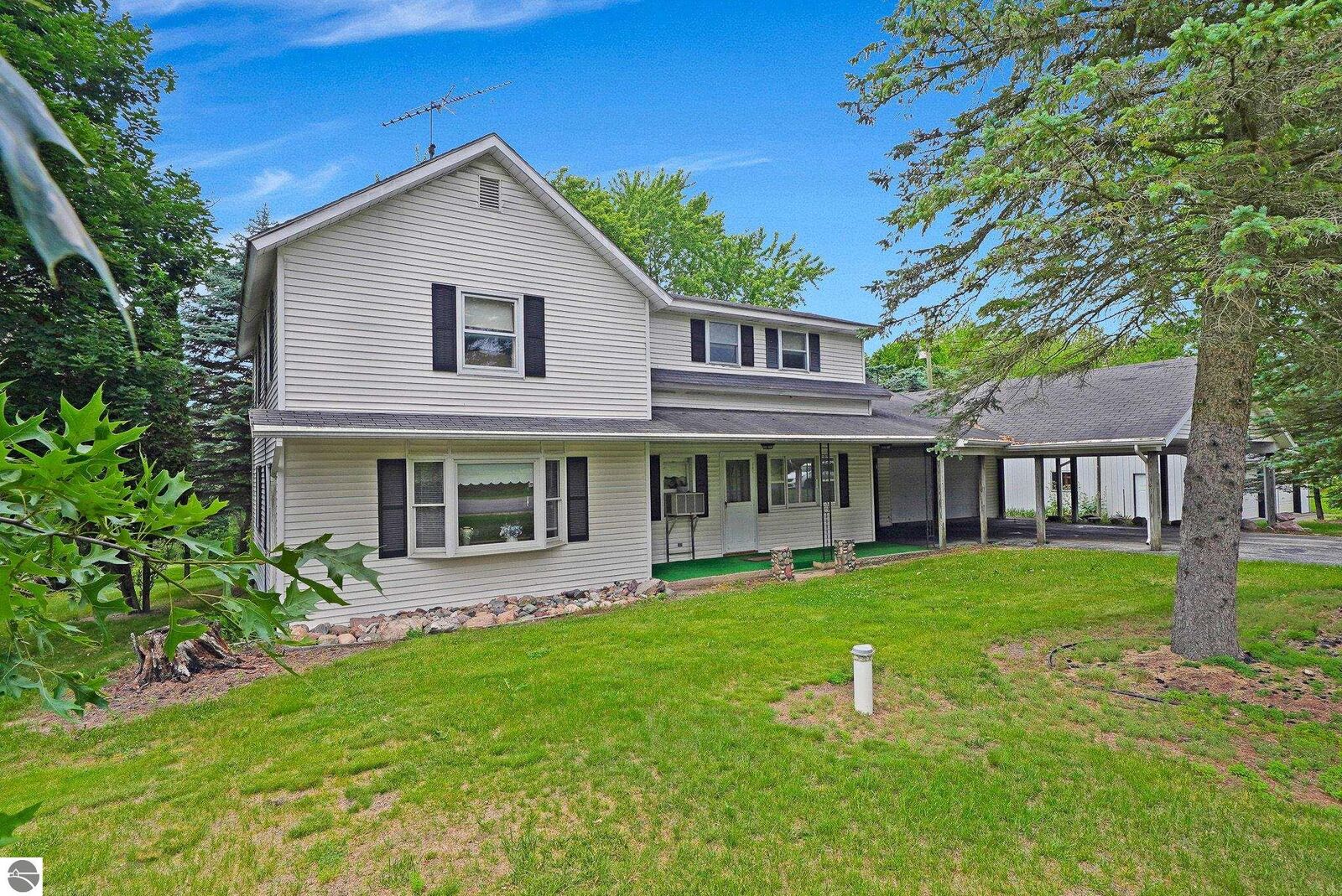 Property Photo:  7017 Twin Lakes Avenue  MI 49665 