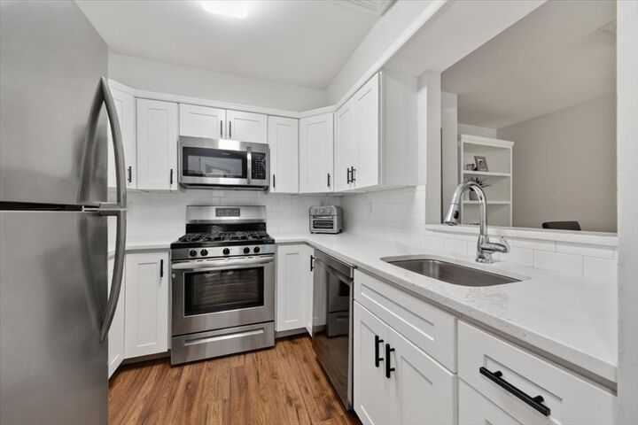 Property Photo: 26 School St. 210 MA 02045