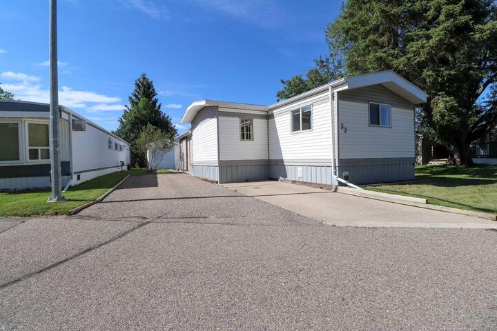 Property Photo:  2300 13 Street N 33  AB T1H 4E8 