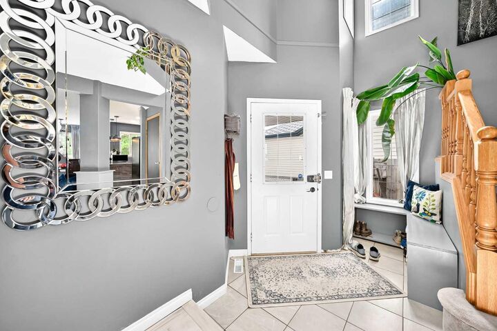 Property Photo:  216 Hidden Spring Green NW  AB T3A 5N4 