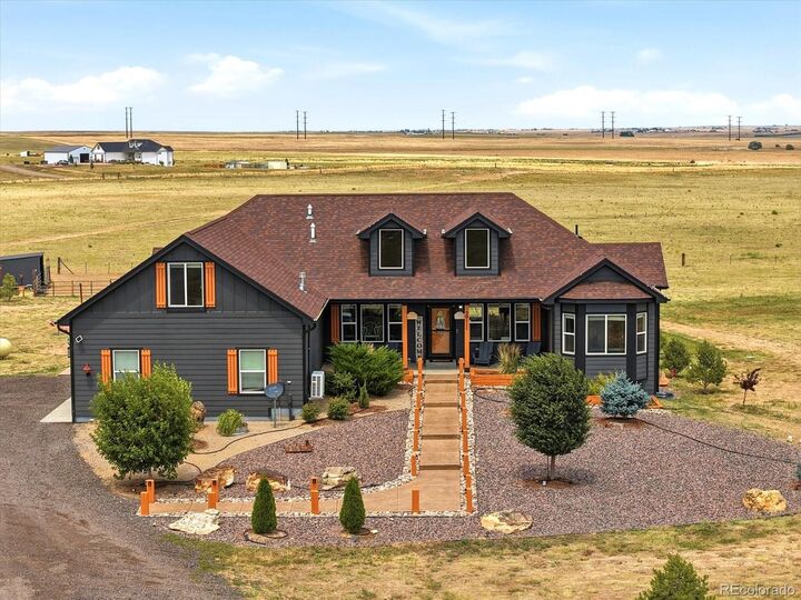 Property Photo:  50111 E Maplewood Place  CO 80102 