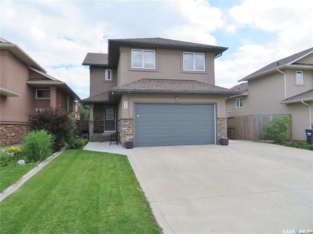 Property Photo:  1214 Rempel Crescent  SK S7T 0M2 