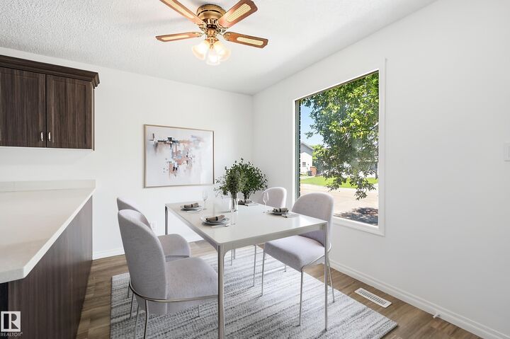 Property Photo:  3413 135 Avenue NW  AB T5A 2V6 