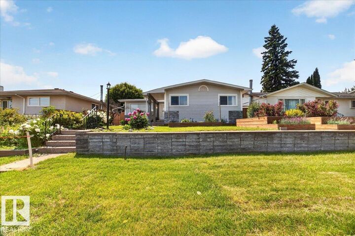 Property Photo: 5211 94A Avenue NW AB T6B 0Y6