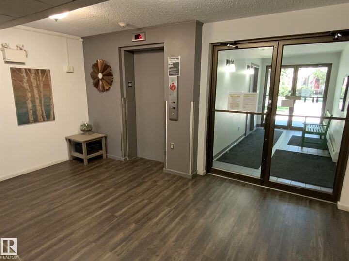Property Photo:  10838 108 Street NW 106  AB T5H 3A6 