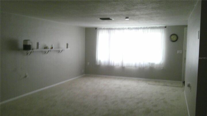 Property Photo: 1203 Chancellor Drive FL 34690