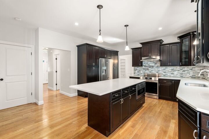 Property Photo:  4 Martin Louis Way  MA 02180 