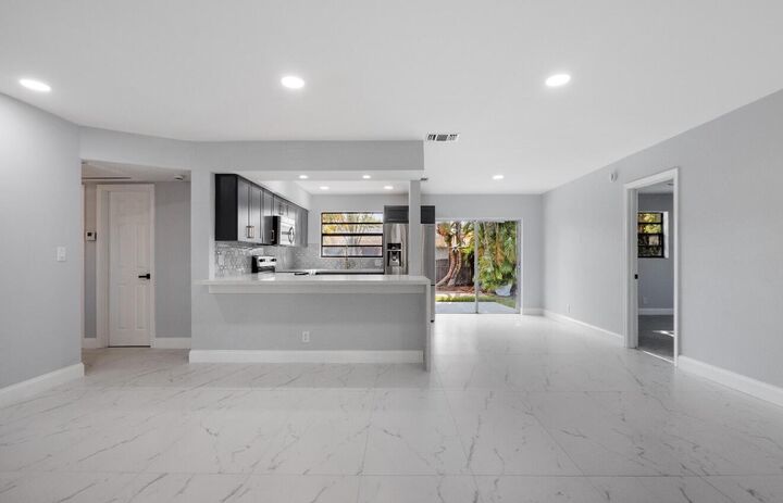 Property Photo:  1661 NW 1st Avenue  FL 33060 