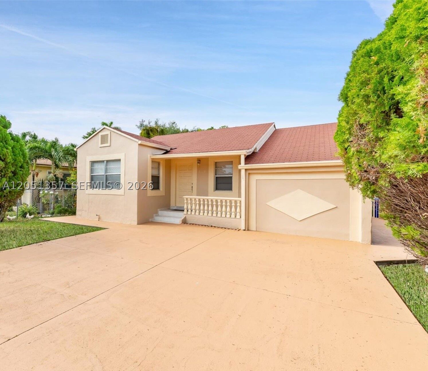 Property Photo:  610 NW 23rd Pl Front  FL 33125 