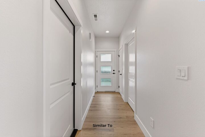 Property Photo:  219 N Dewberry Pl  WA 99336 