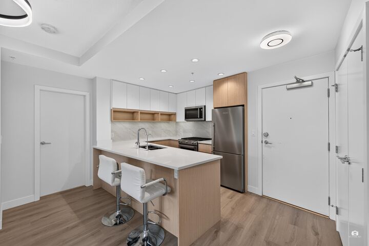 8940 University Crescent 105 — photo 1