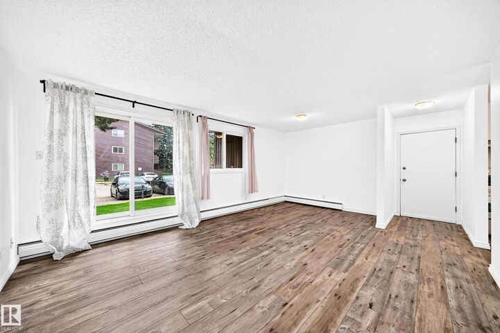 Property Photo: 2303 119 Street NW 104 AB T6J 4E2