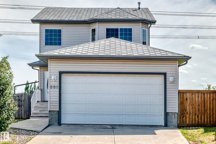 Property Photo: 686 Kananaskis Drive AB T9G 2G8