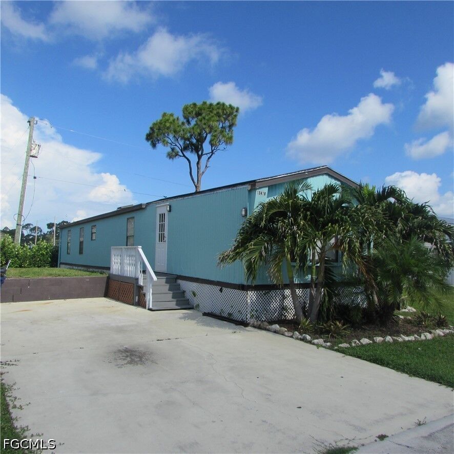 Property Photo:  10419 Trotwood Avenue  FL 33956 