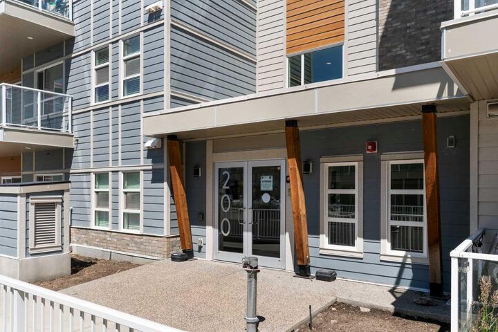 Property Photo: 200 Harvest Hills Place NE 305 AB T3K 2N3