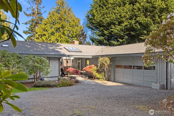 Property Photo:  10700 NE Broomgerrie Road  WA 98110 