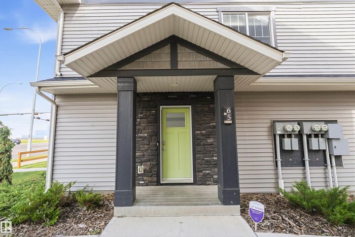 Property Photo: 50 McLaughlin Drive 65 AB T7X 0E1
