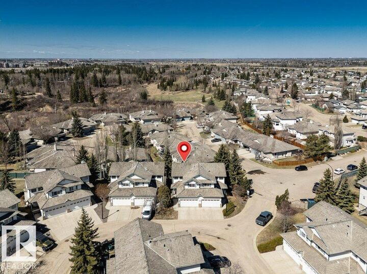 Property Photo: 211 Blackburn Drive SW 23 AB T6W 1C6