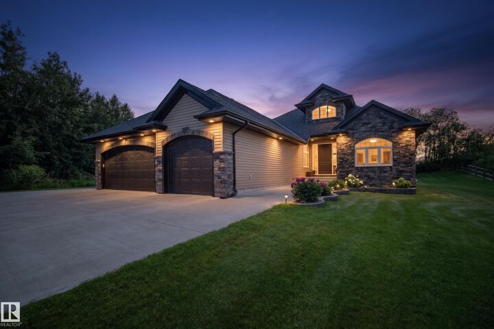 Property Photo: 23549 Twp Rd 510 115 AB T4X 0T1