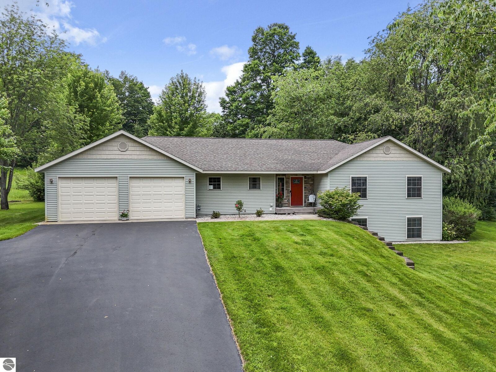 Property Photo:  210 Cinnamon Lane  MI 49696 