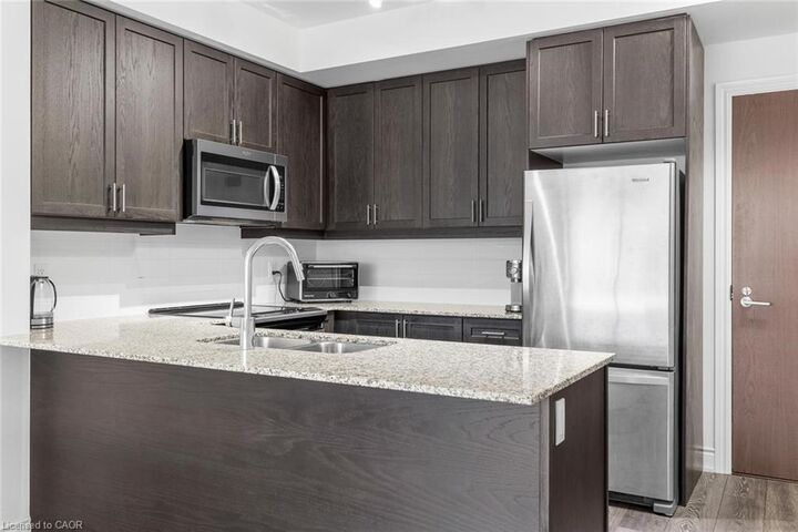 Property Photo: 1050 Main Street E 226 ON L9T 6H7