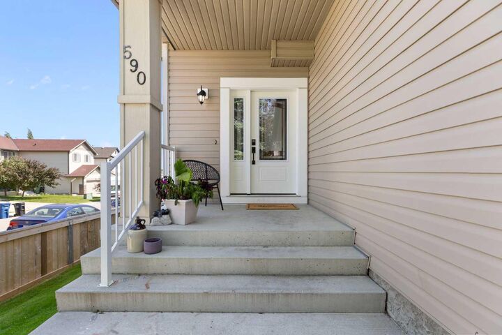 Property Photo: 590 Coopers Drive SW AB T4B 3M4