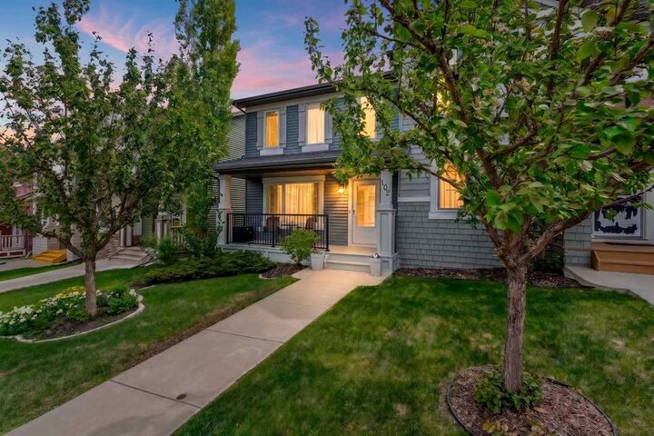 Property Photo: 102 Panatella Hill NW AB T3K 0B6
