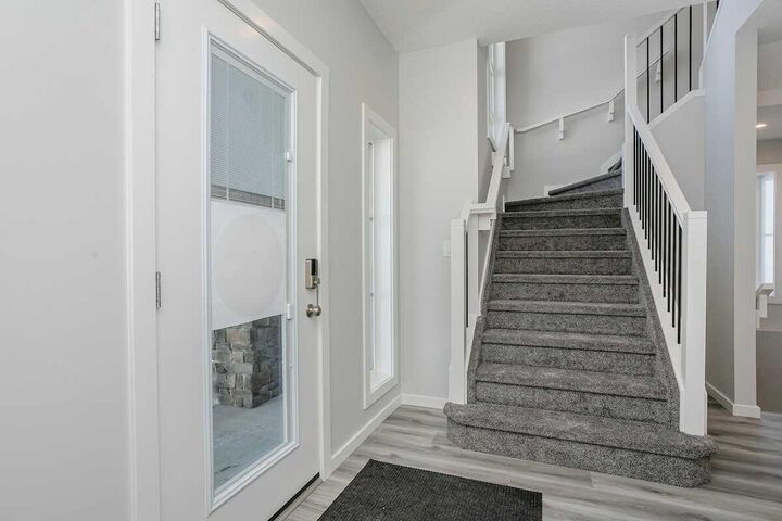 Property Photo:  235 Heartwood Grove SE  AB T3M 2K1 