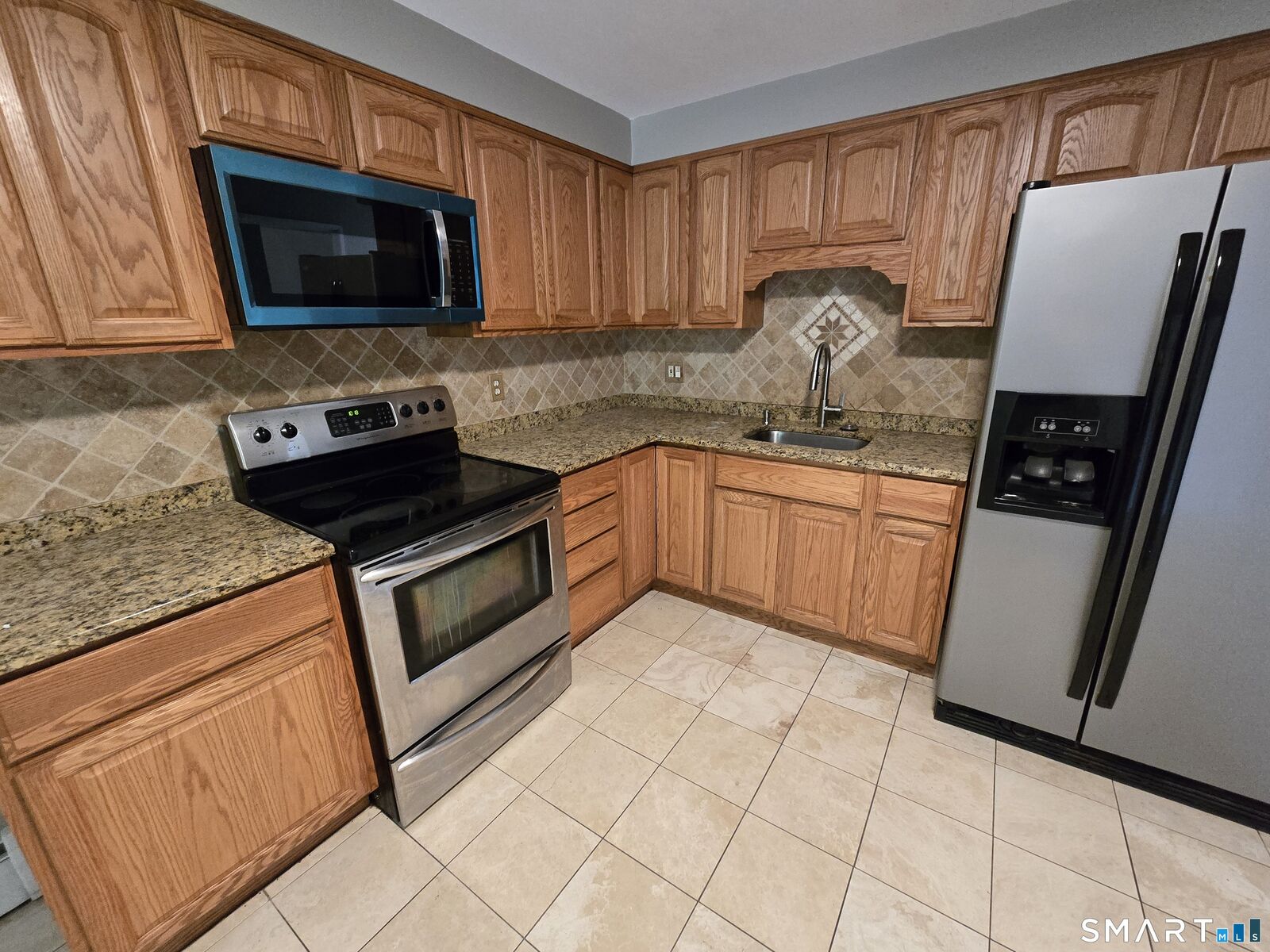 Property Photo:  65 Terrace Gardens 65  CT 06492 