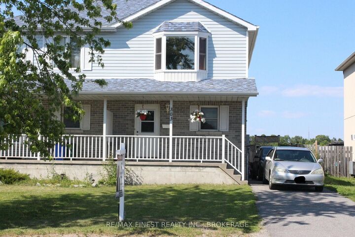 303 Conacher Drive — photo 1