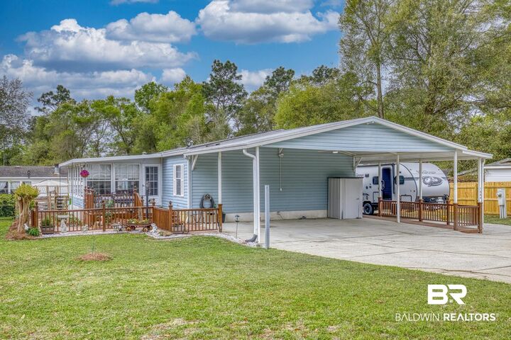 Property Photo:  1864 Princess Lane  AL 36549 