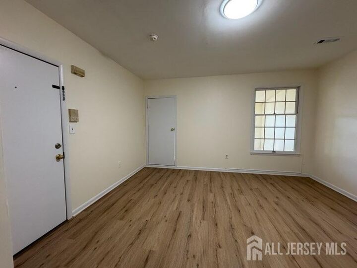 Property Photo:  431-437 Main Street 2A  NJ 08840 