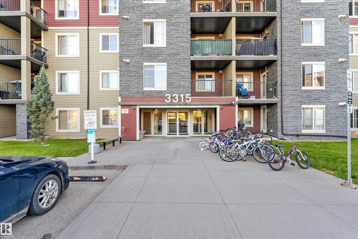 Property Photo: 3315 James Mowatt Trail SW 430 AB T6W 3L9